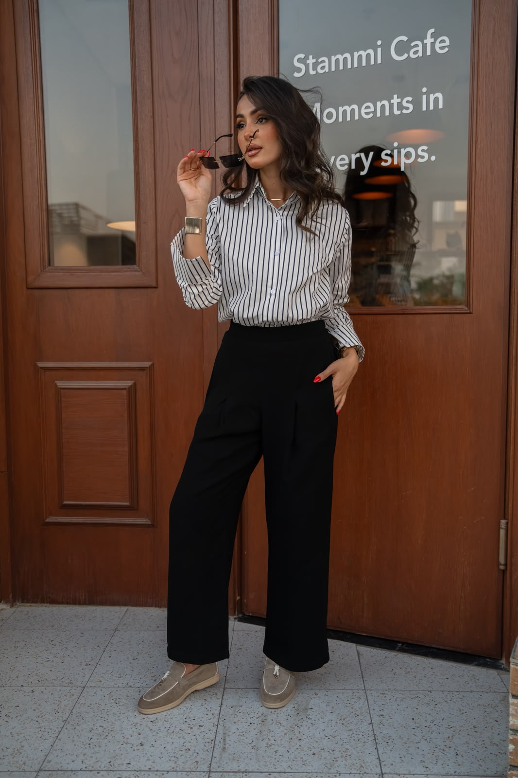 A cotton blouse with crepe pants.C:248