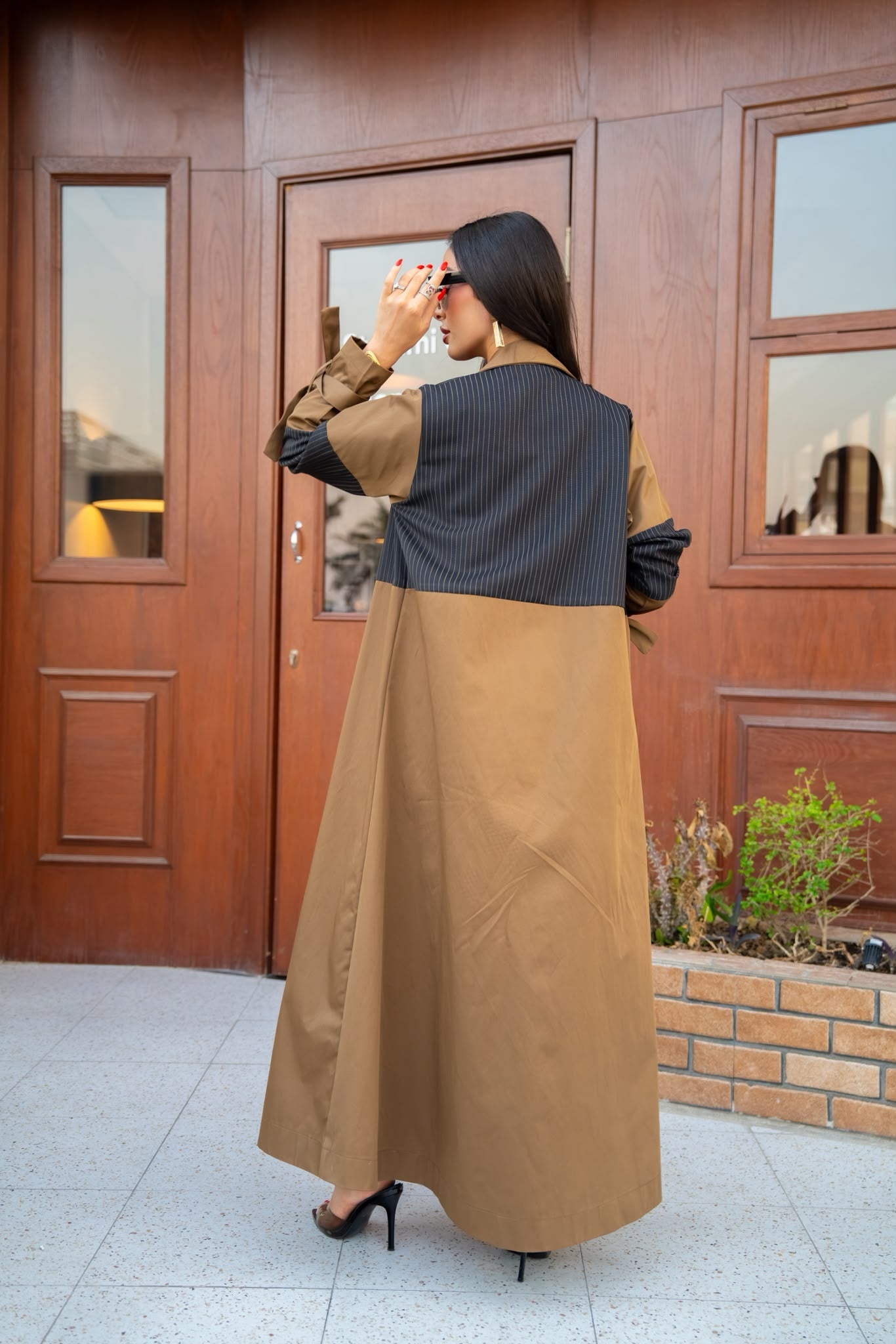 Camel-colored trench coat.C:6817