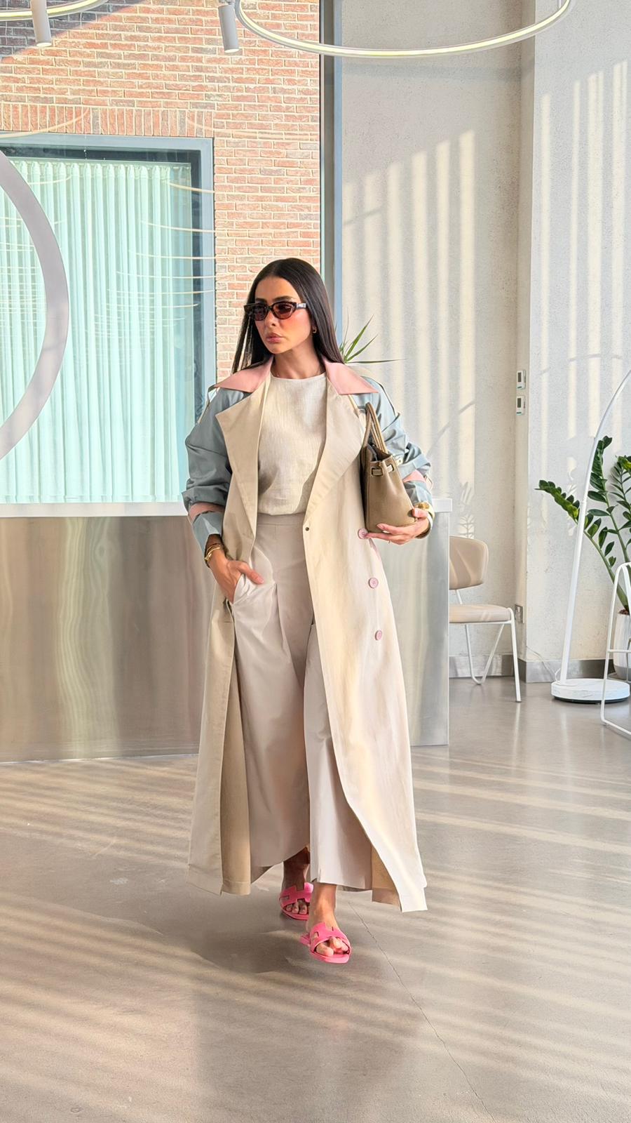 Beige trench coat with sky blue accents.C:6815
