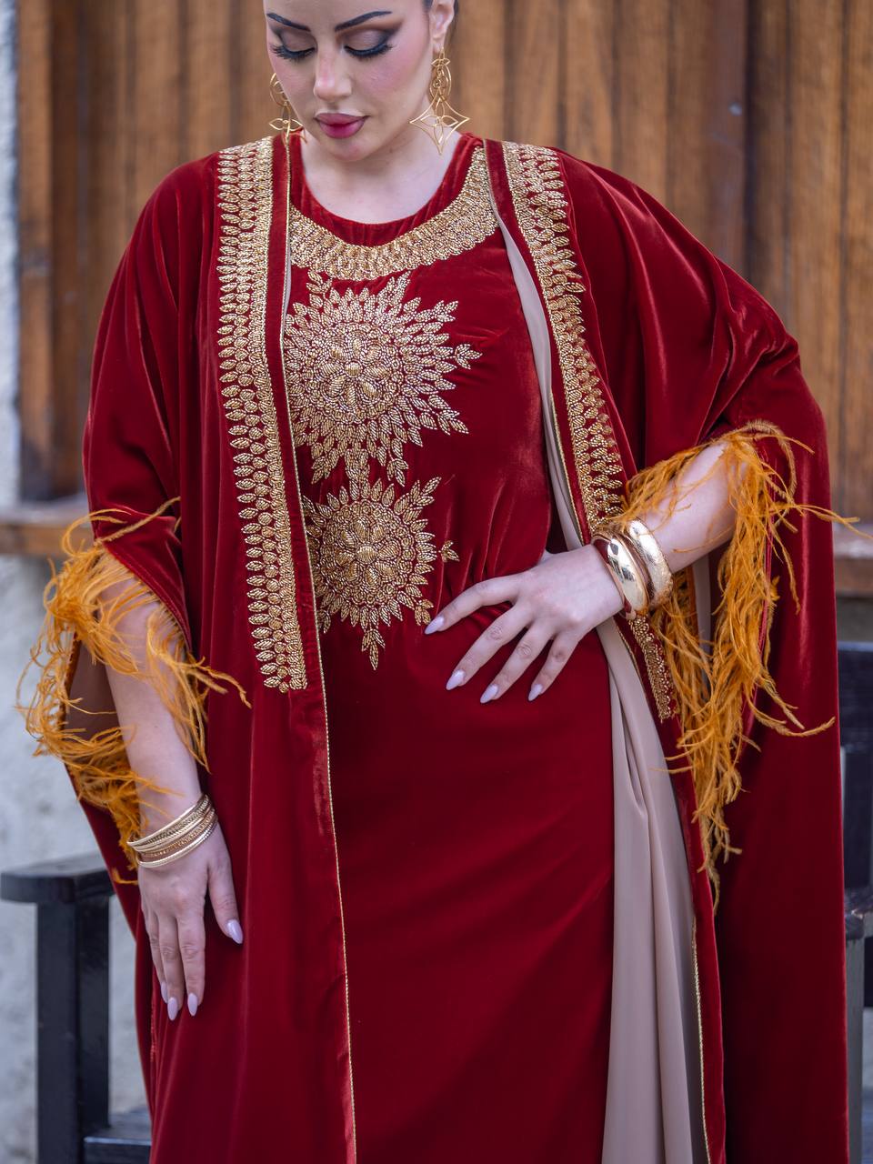 Bisht and dress set in burgundy velvet with hand embellishment.C:6714