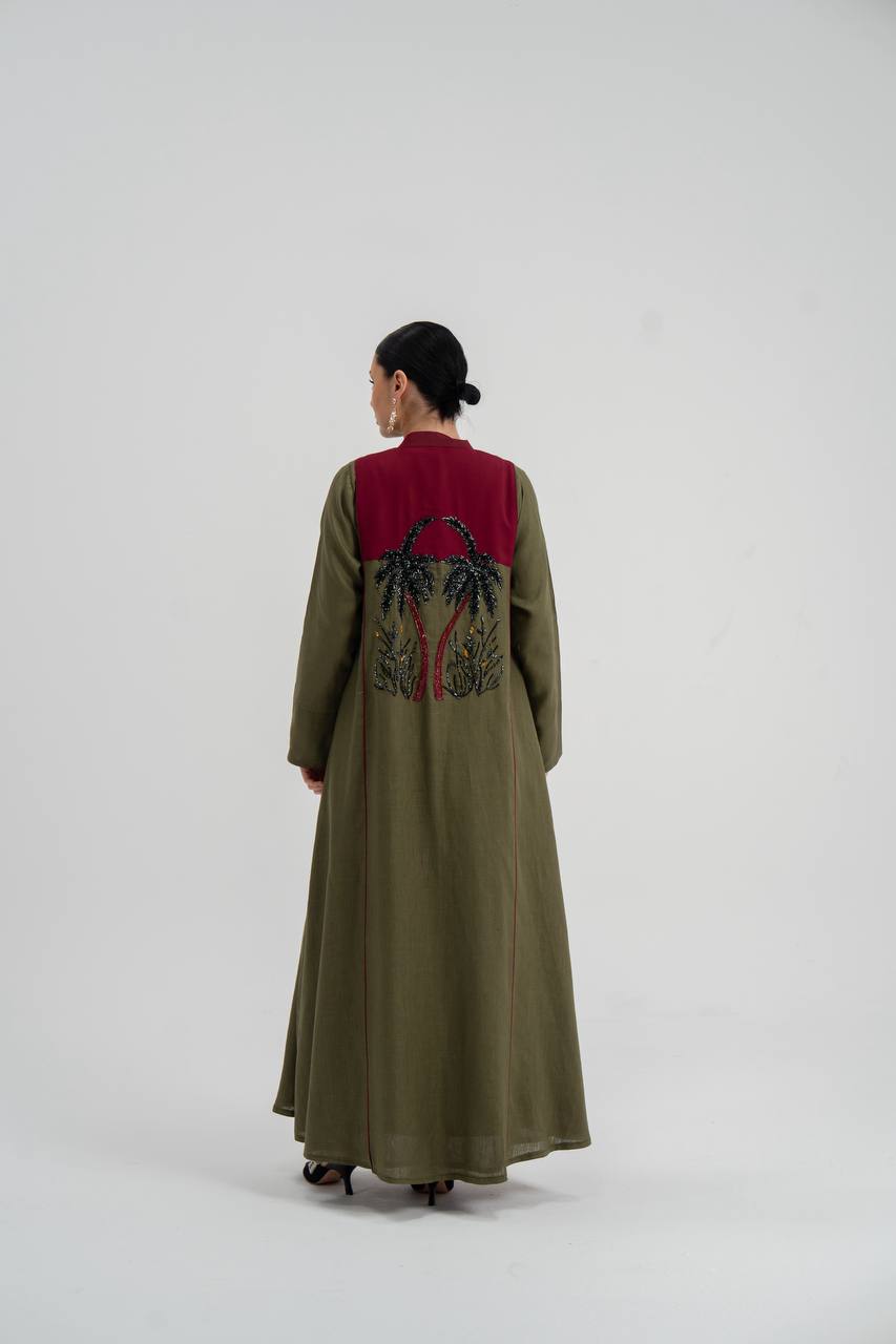 Linen abaya in olive green with hand embroidery. C:6748