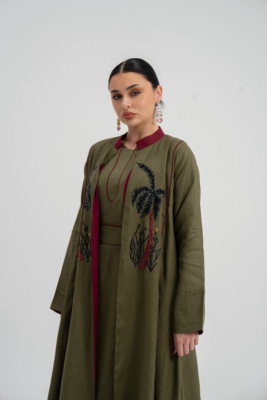 Linen abaya in olive green with hand embroidery. C:6748