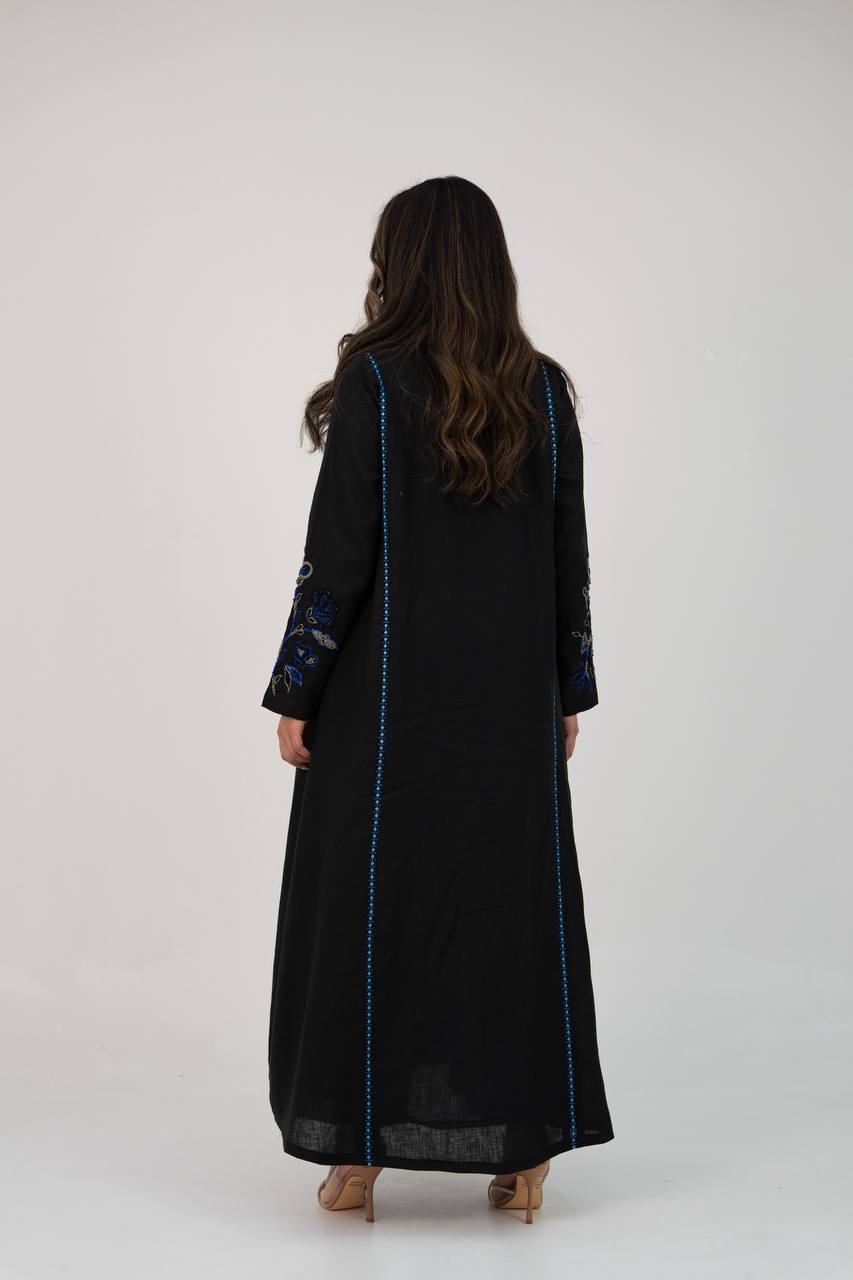 Black linen trench coat with hand embroidery and beading. C:6768