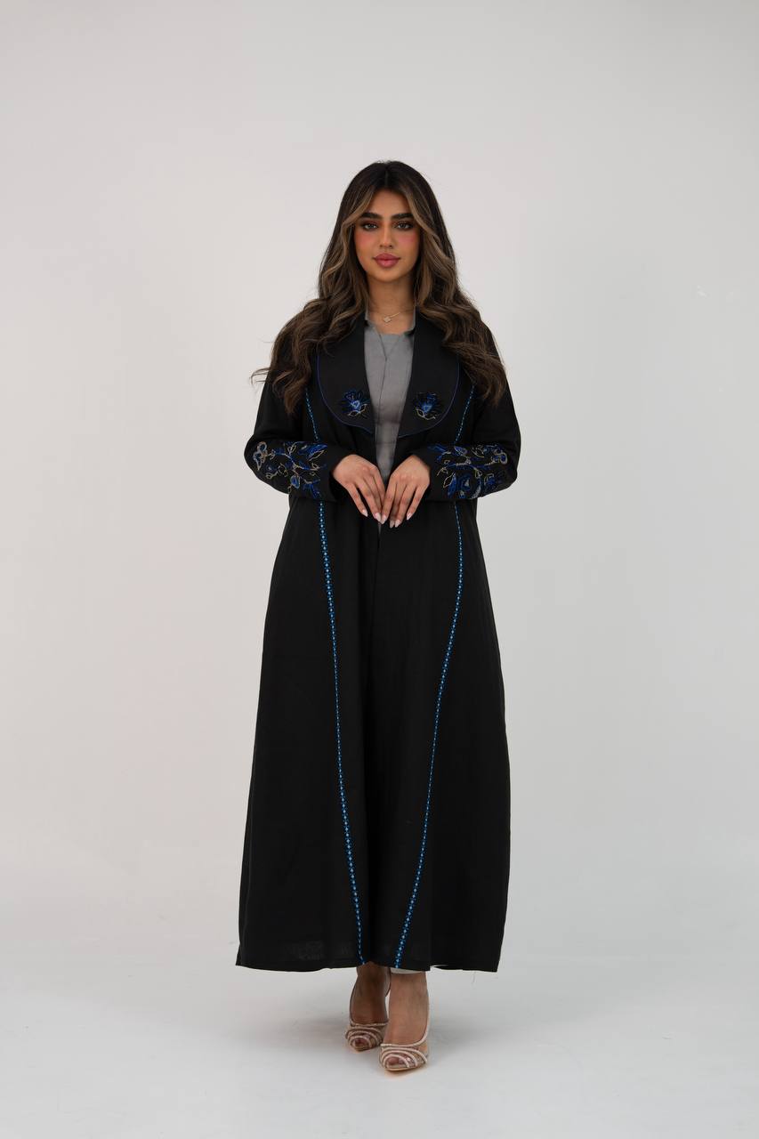 Black linen trench coat with hand embroidery and beading. C:6768
