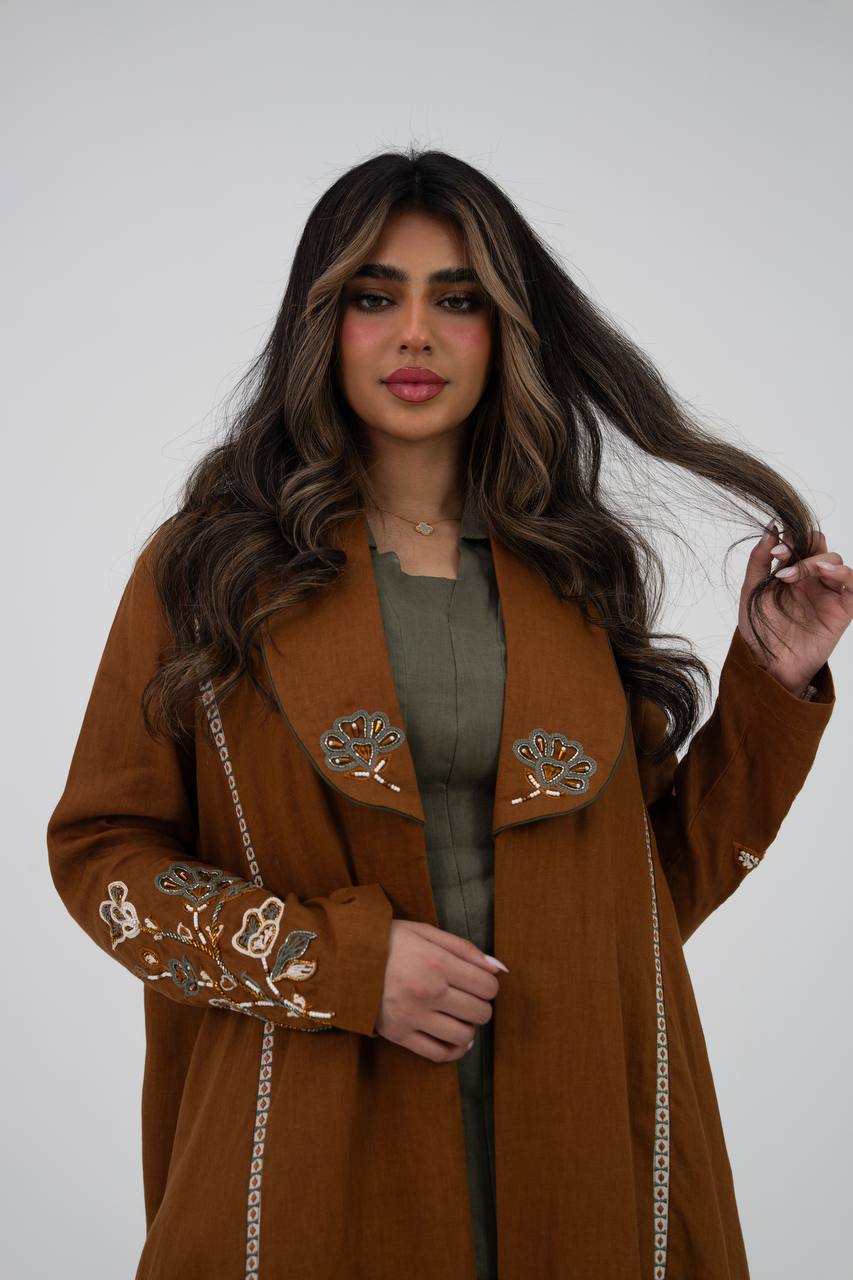Camel-colored linen trench coat with hand embroidery and beading. C:6768