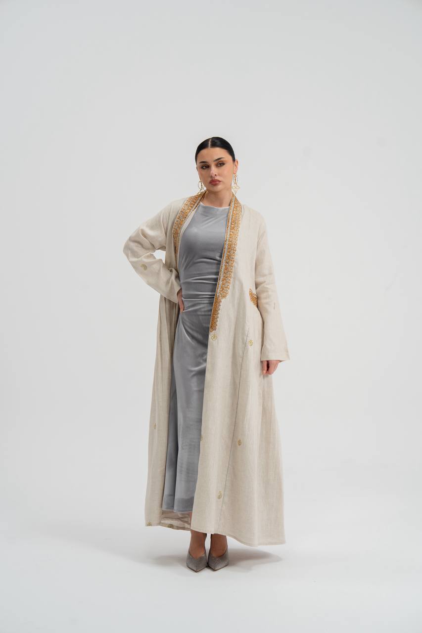 Linen abaya in light beige with embroidery. C:6745
