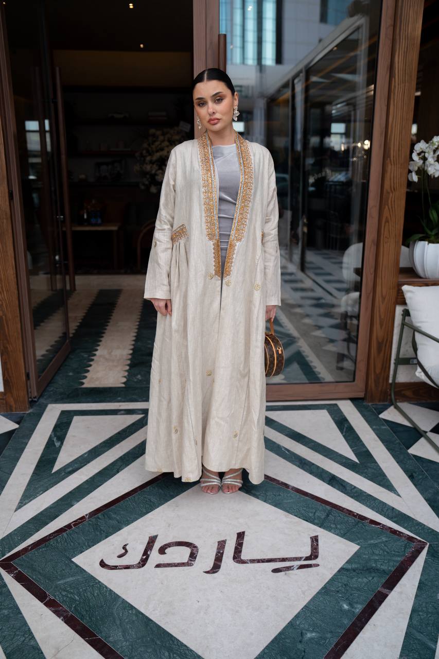Linen abaya in light beige with embroidery. C:6745