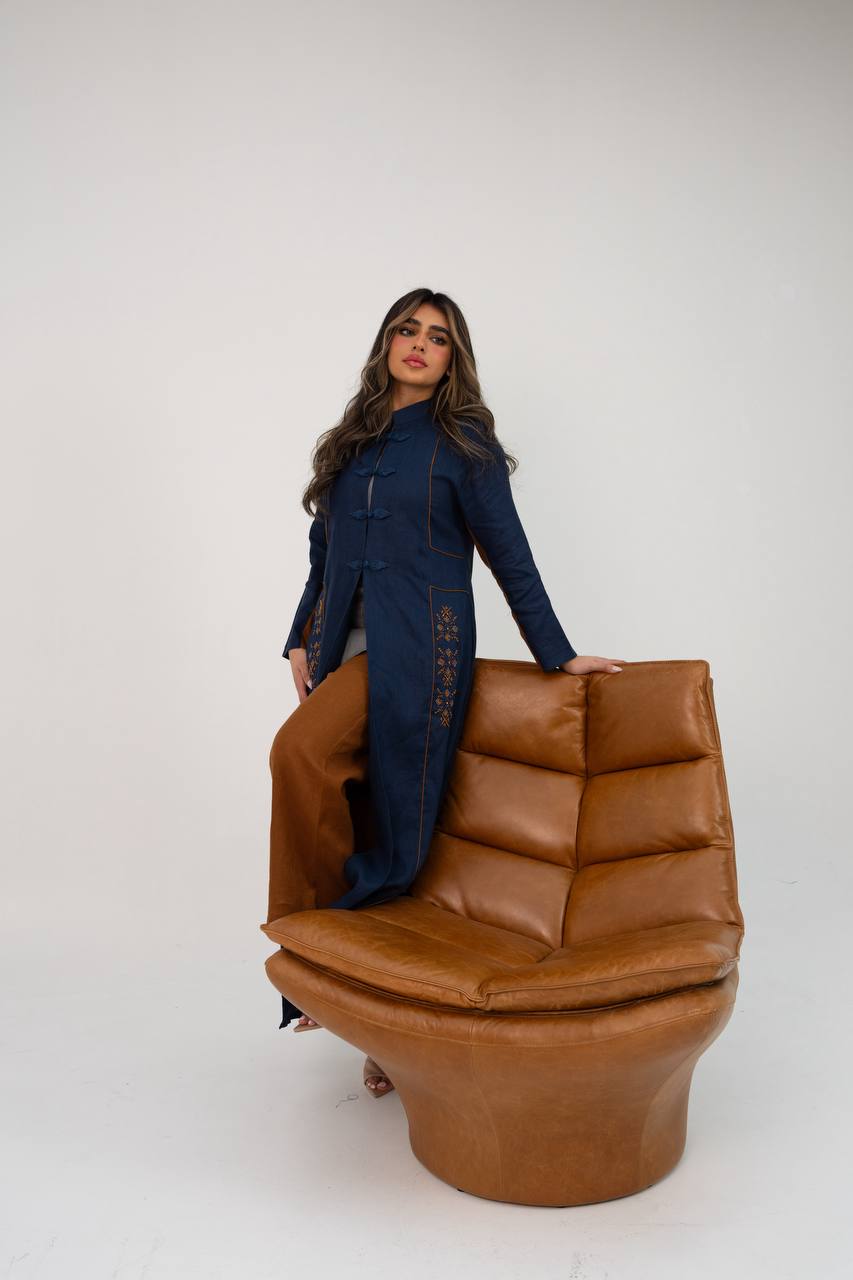 Linen abaya in navy blue with hand-stitched details. C:6766