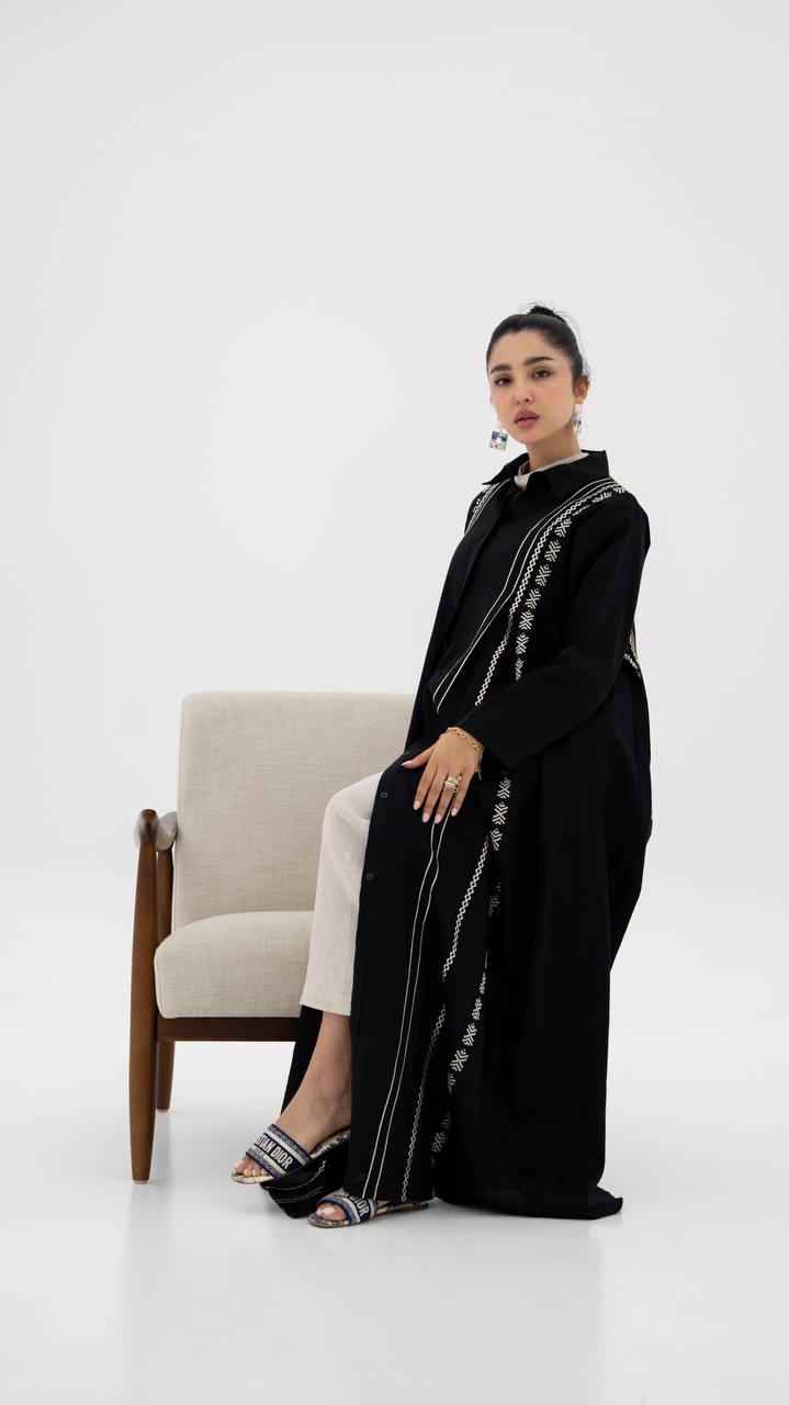 Linen abaya in black with embroidery. C:6683