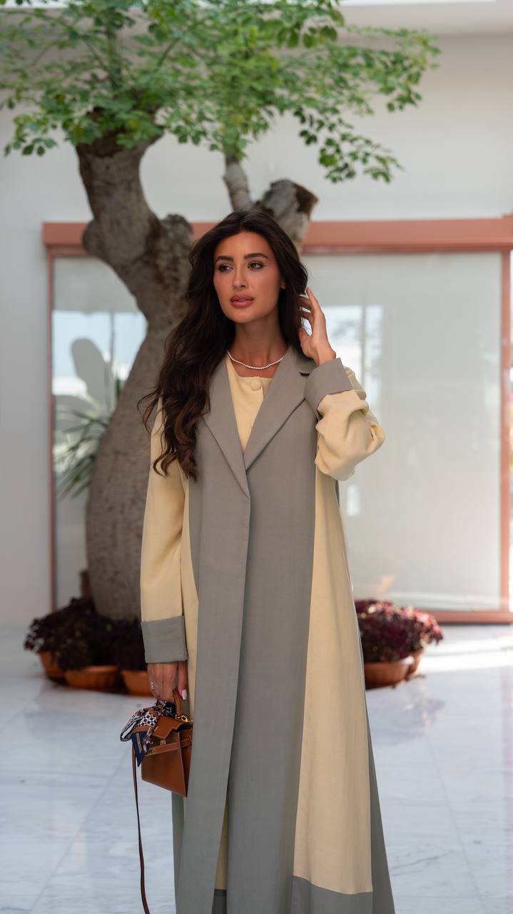 Linen abaya in yellow and pistachio green with hand-stitched details.C:6798