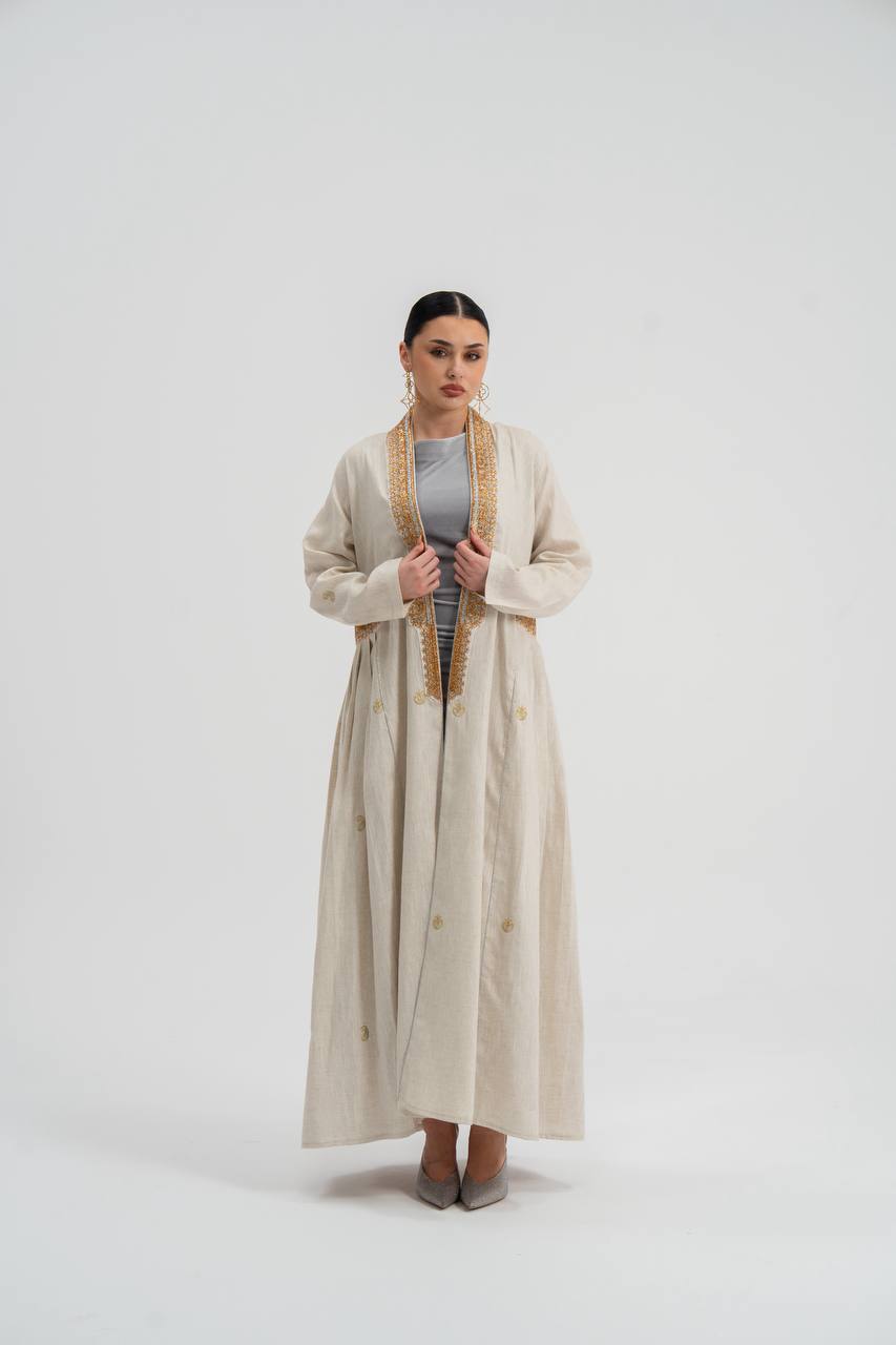 Linen abaya in light beige with embroidery. C:6745