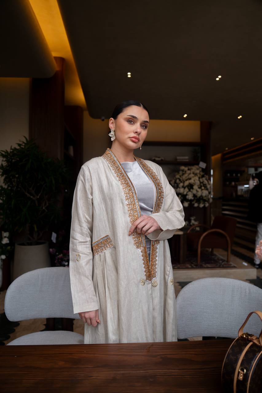 Linen abaya in light beige with embroidery. C:6745