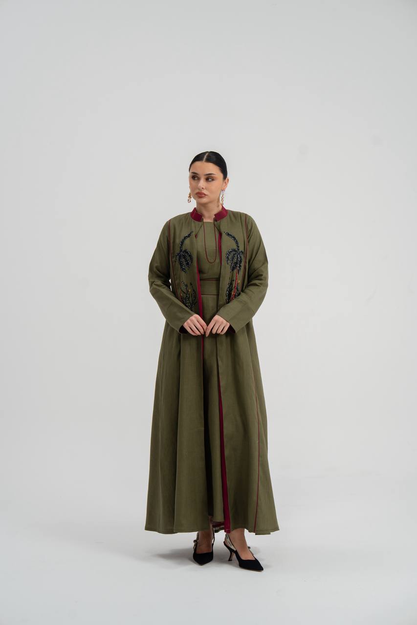 Linen abaya in olive green with hand embroidery. C:6748