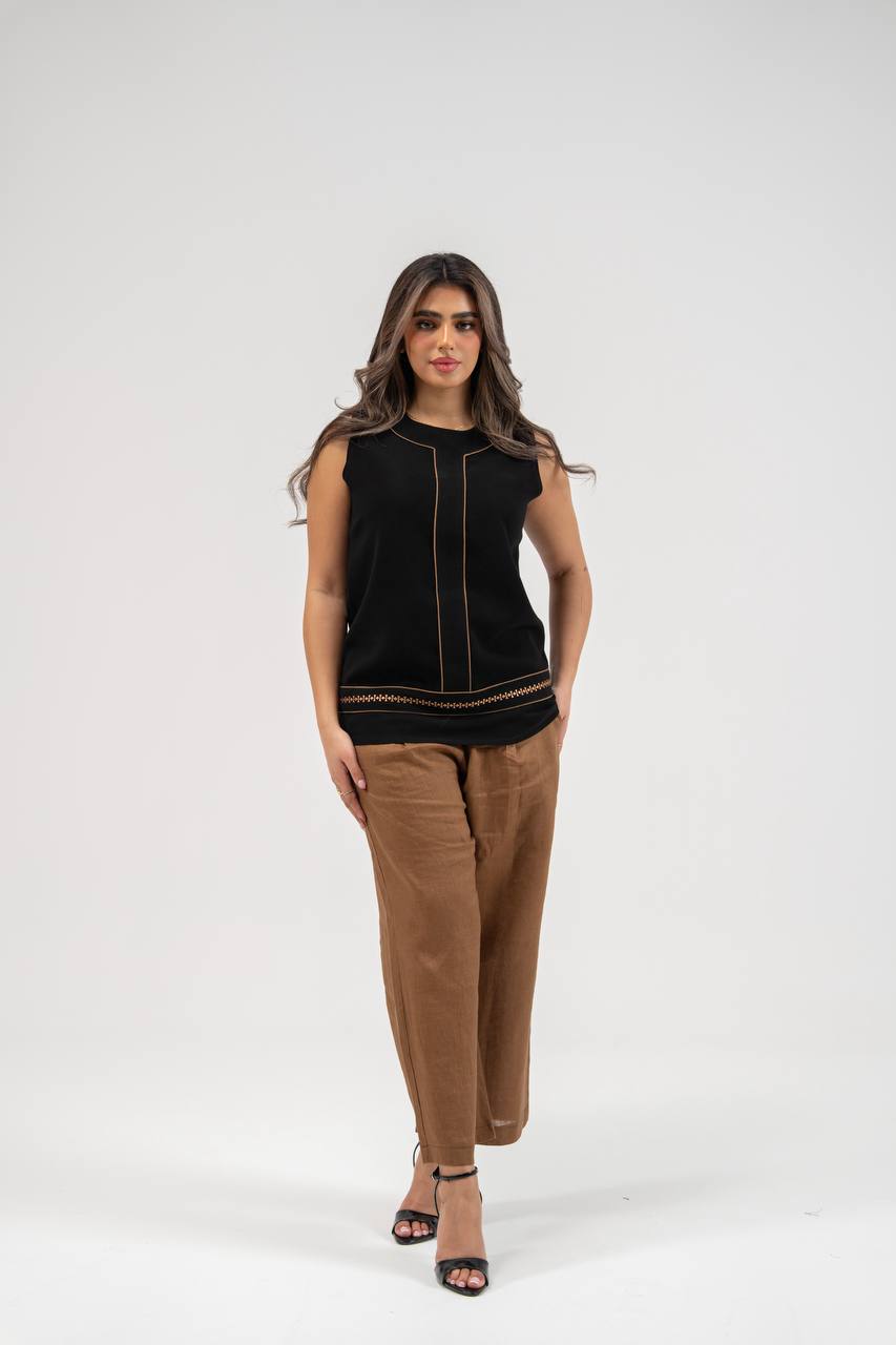 Black blouse and camel-colored pants set. C:231