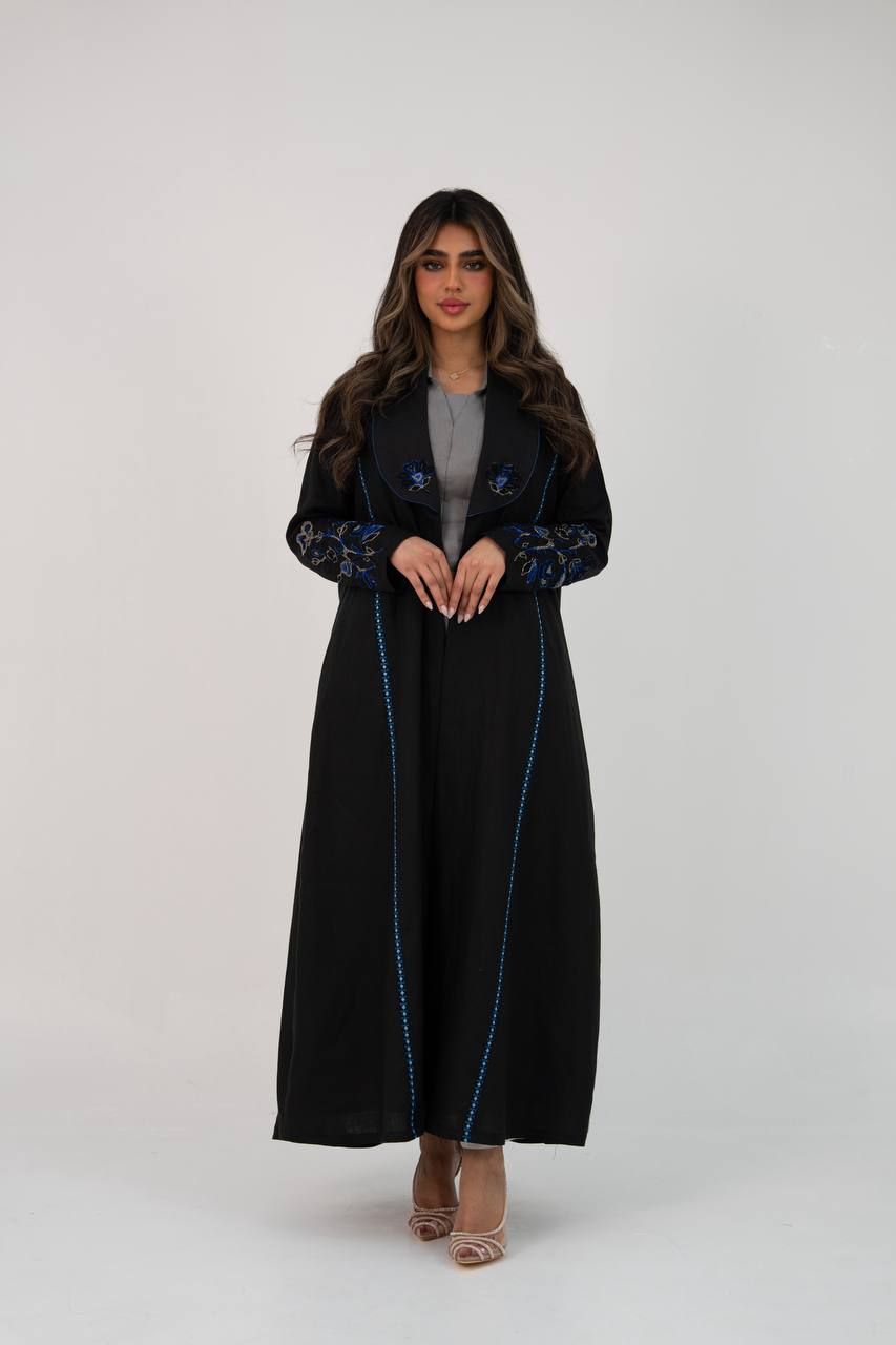 Black linen trench coat with hand embroidery and beading. C:6768