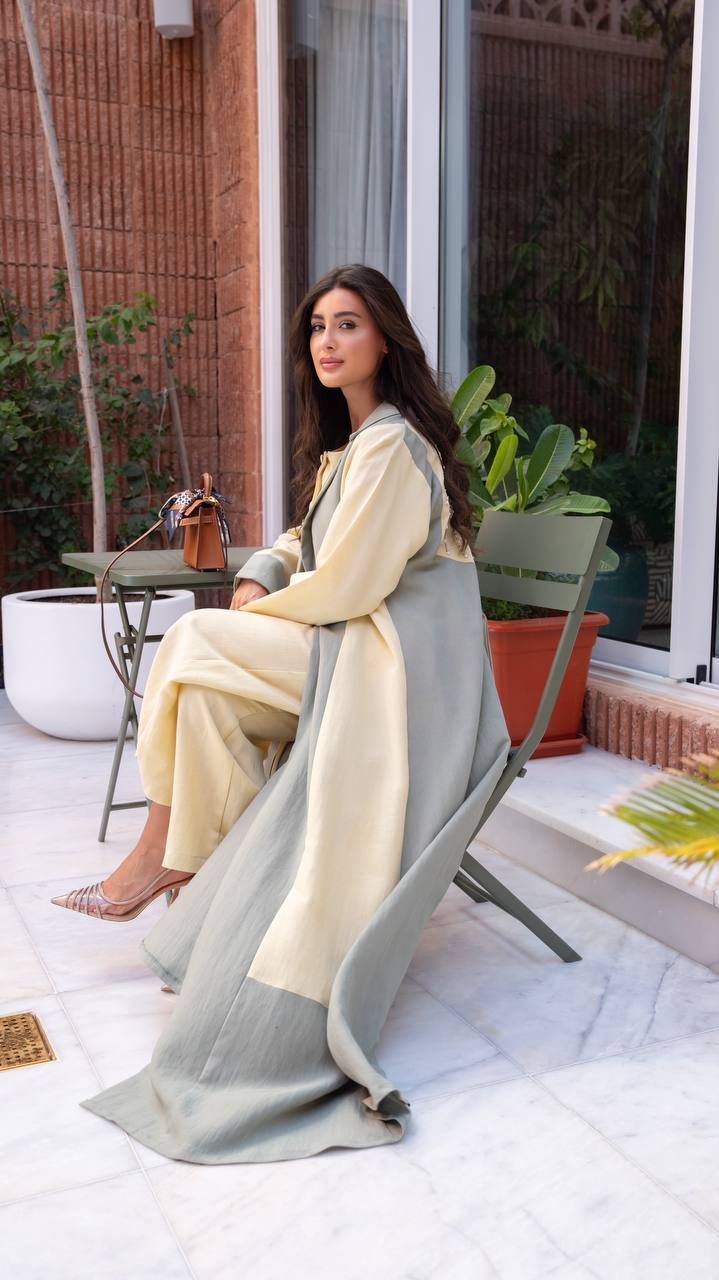 Linen abaya in yellow and pistachio green with hand-stitched details.C:6798