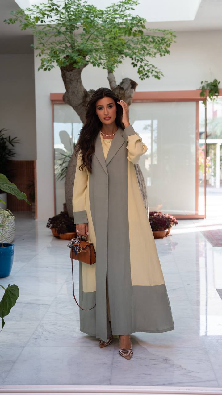 Linen abaya in yellow and pistachio green with hand-stitched details.C:6798