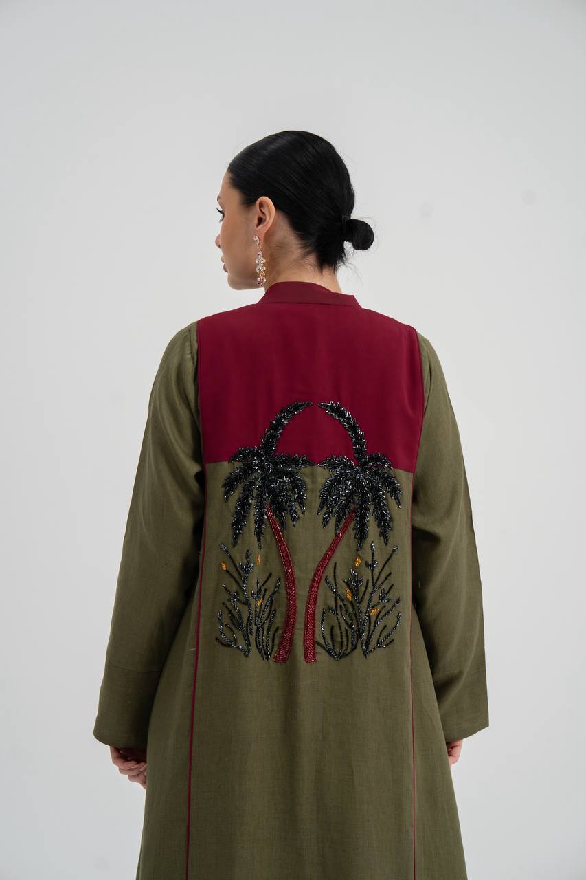 Linen abaya in olive green with hand embroidery. C:6748