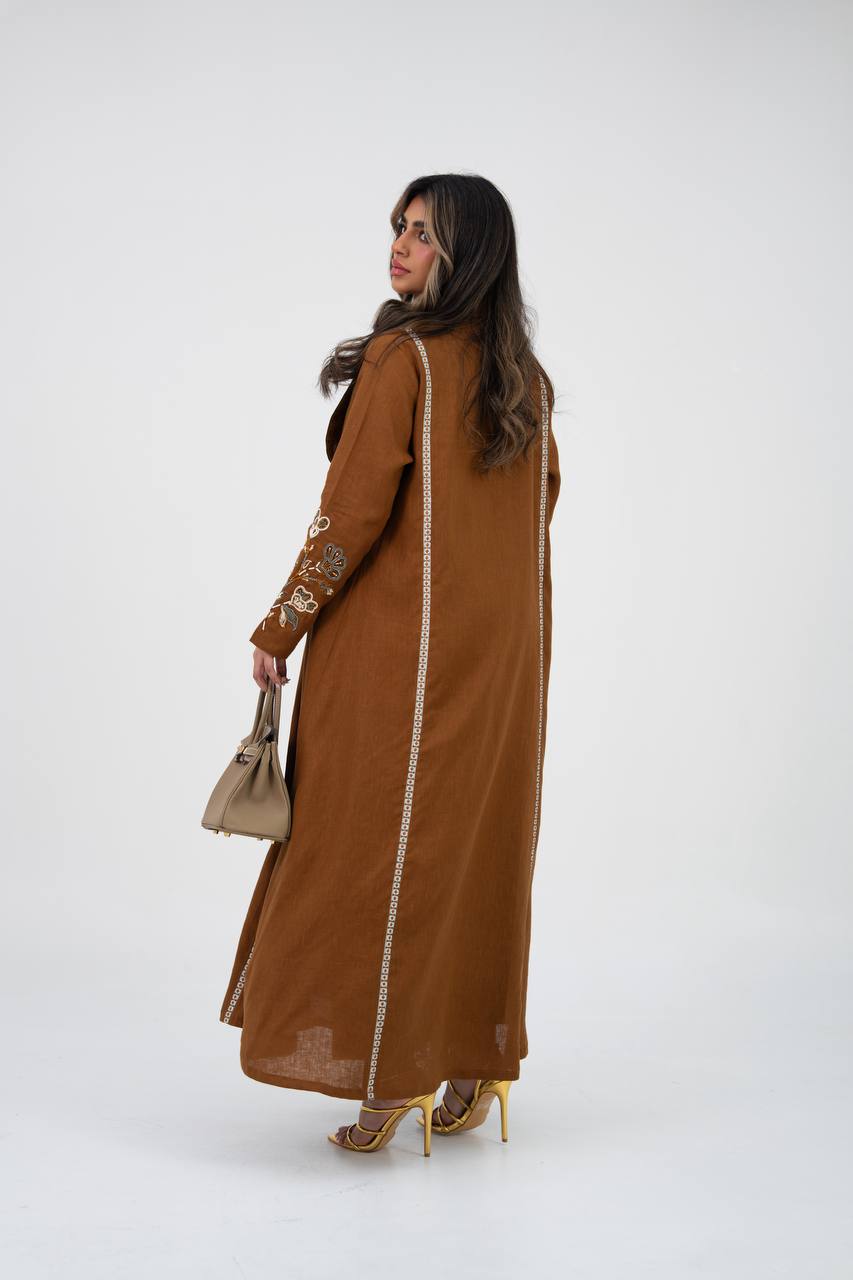 Camel-colored linen trench coat with hand embroidery and beading. C:6768