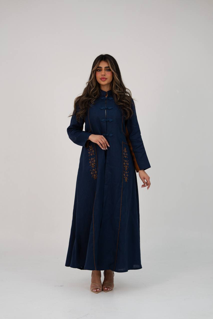Linen abaya in navy blue with hand-stitched details. C:6766