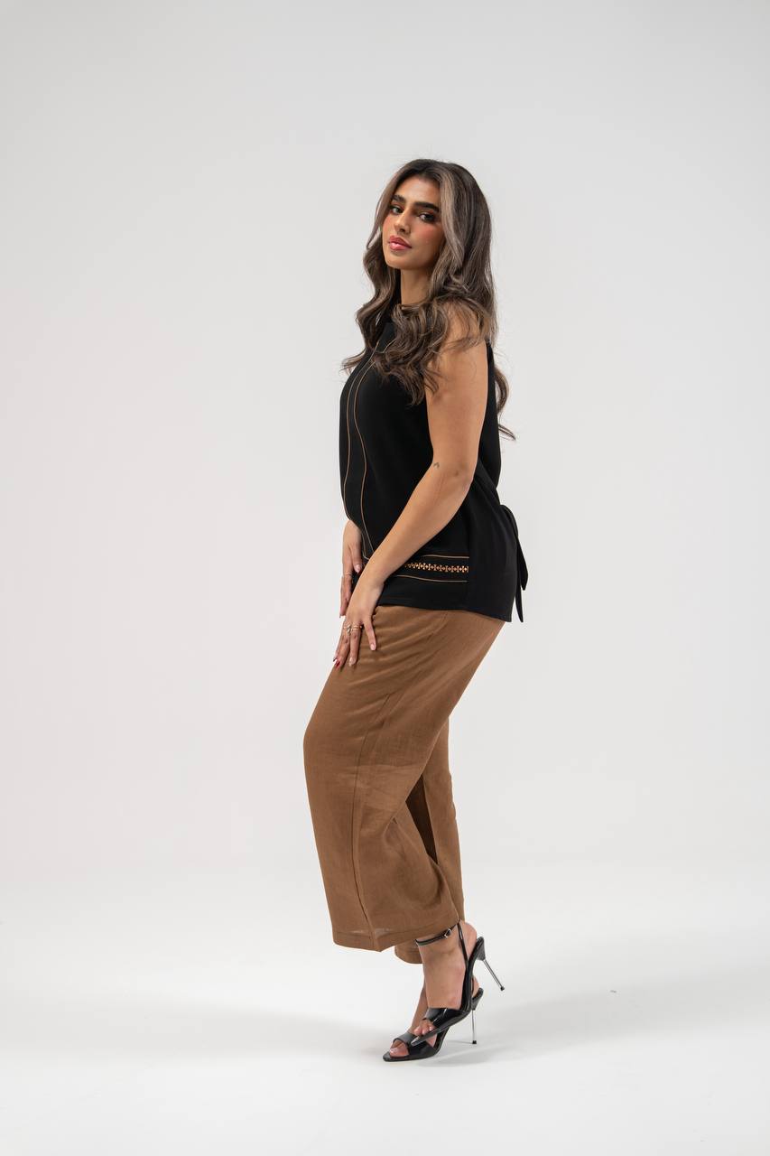 Black blouse and camel-colored pants set. C:231