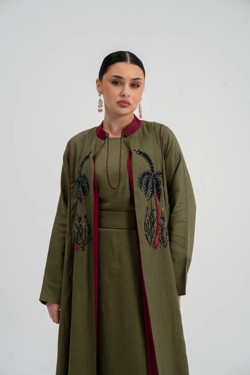 Linen abaya in olive green with hand embroidery. C:6748