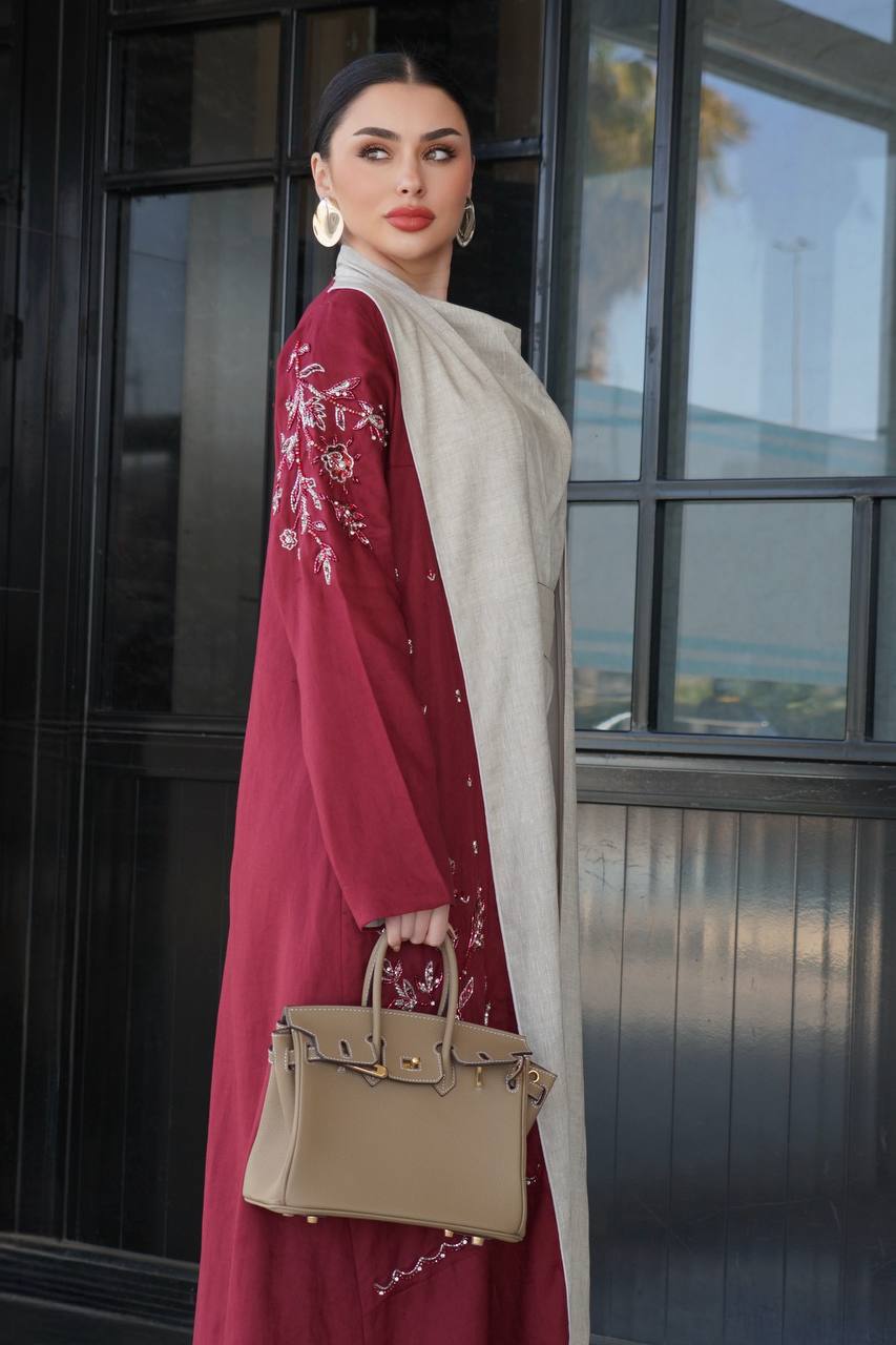 عباية لينن باللون العنابي مع شك يدوي . C:6753