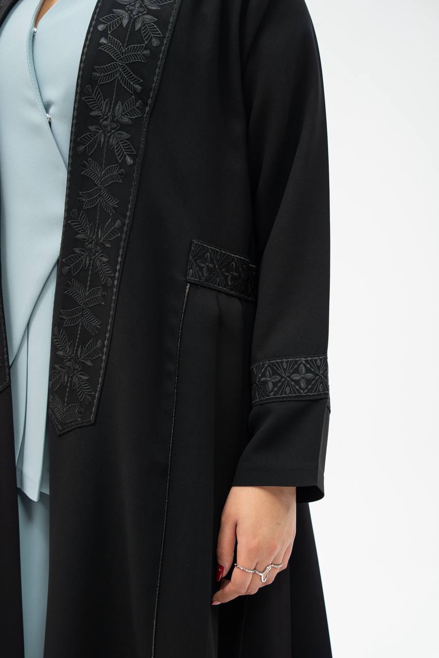 Black crepe abaya with hand-stitched details.C:6700 black crepe