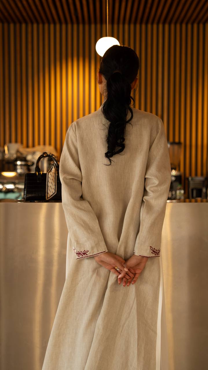 Linen abaya in beige with hand embroidery and beading. C:6791