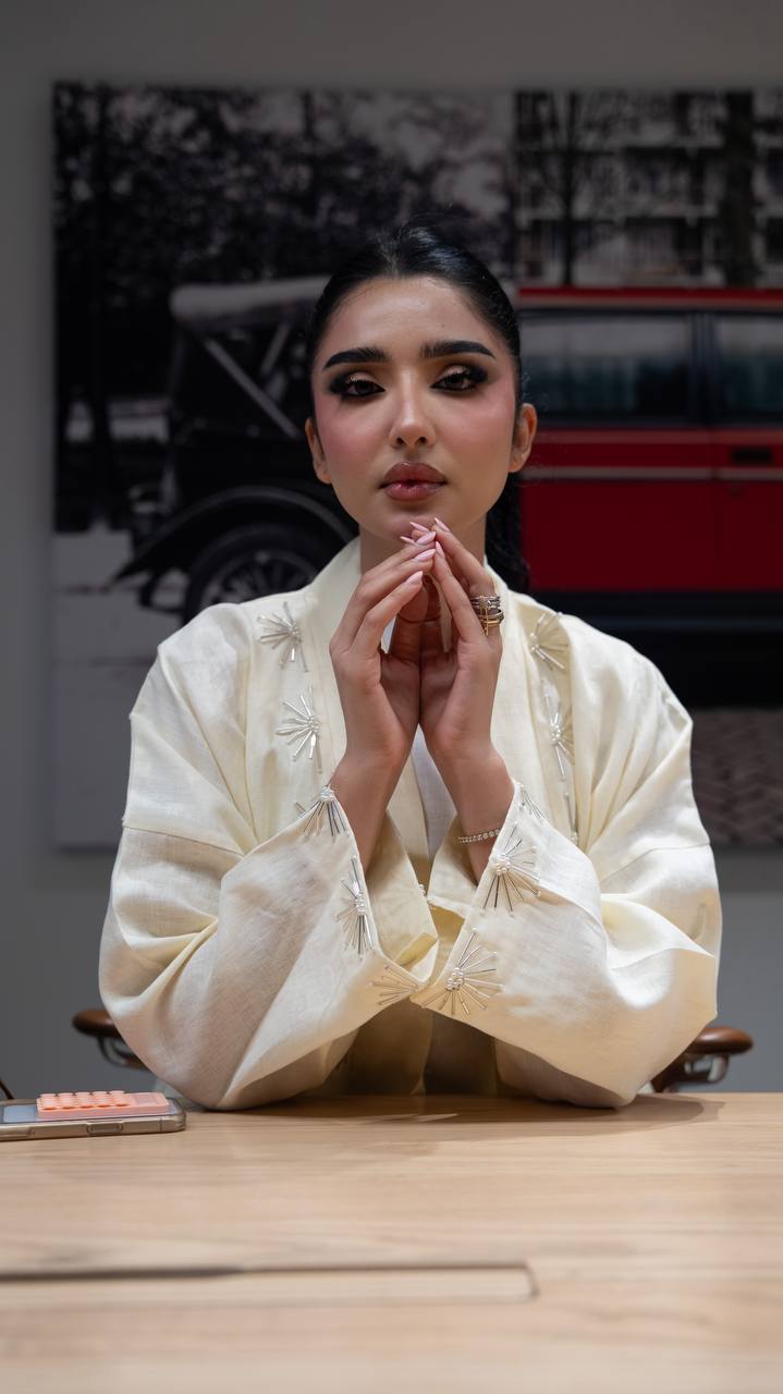 Yellow linen abaya with hand-stitched details. C:6790