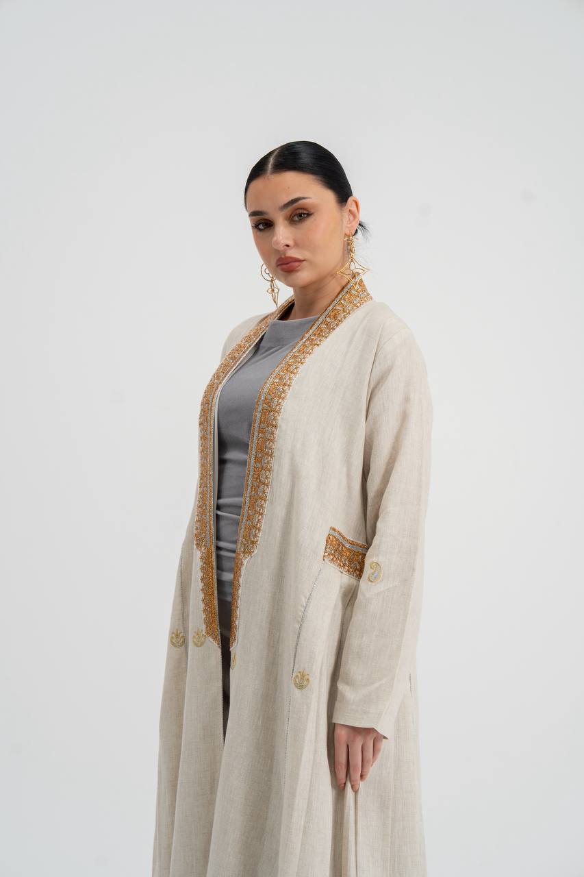 Linen abaya in light beige with embroidery. C:6745