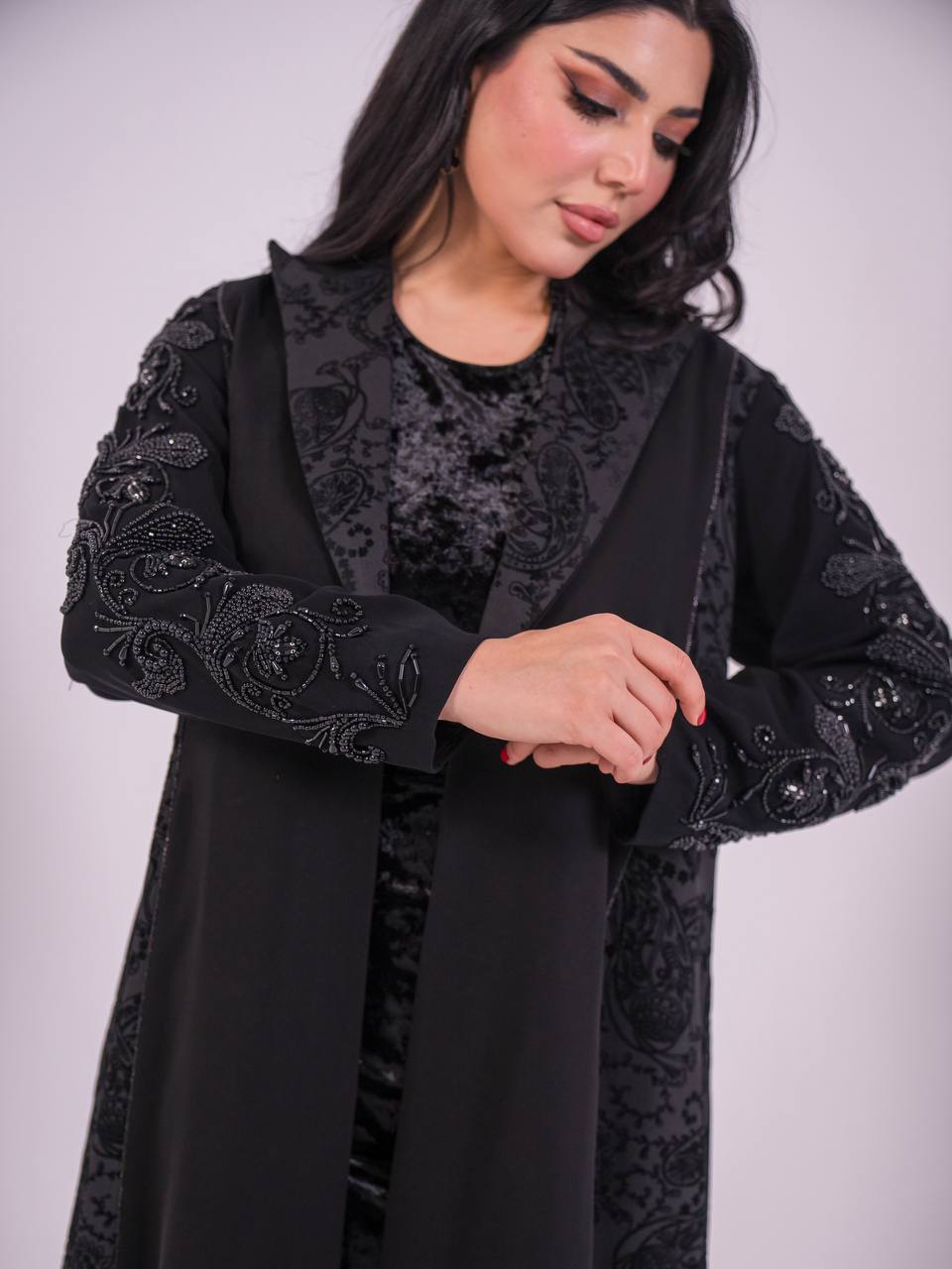 Crepe blazer abaya with black printed crepe and hand-stitched details.C:6733