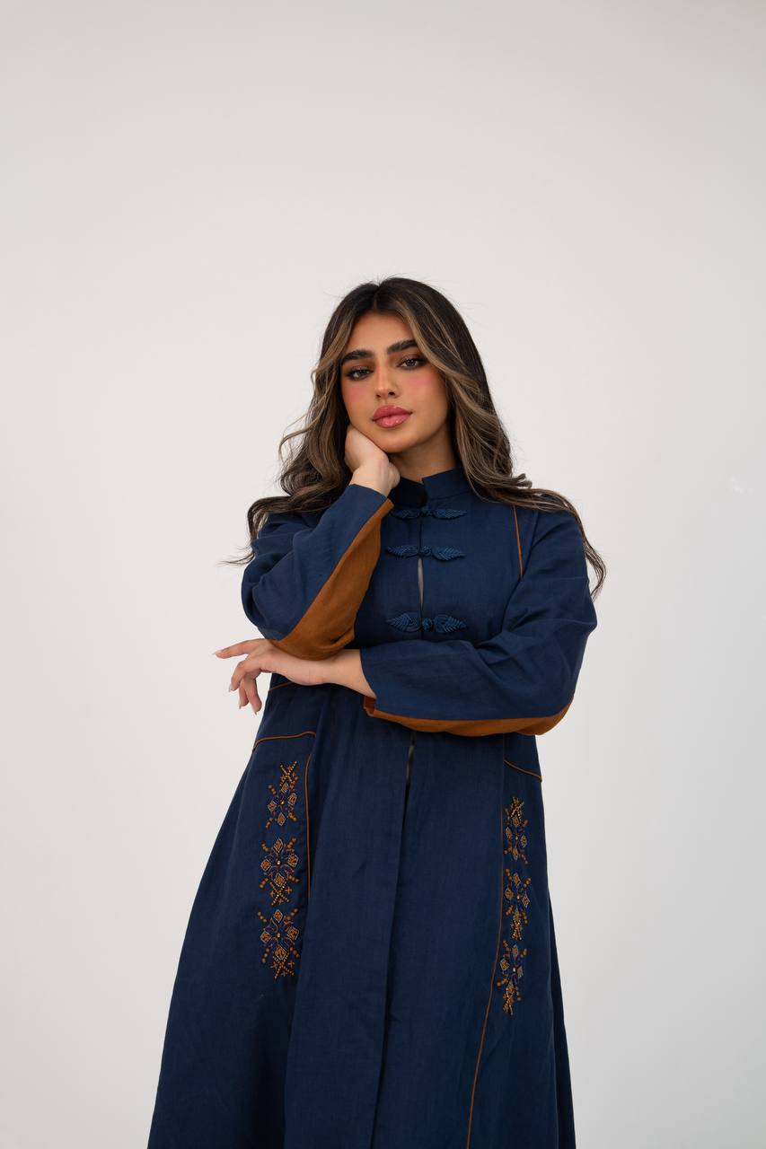 Linen abaya in navy blue with hand-stitched details. C:6766