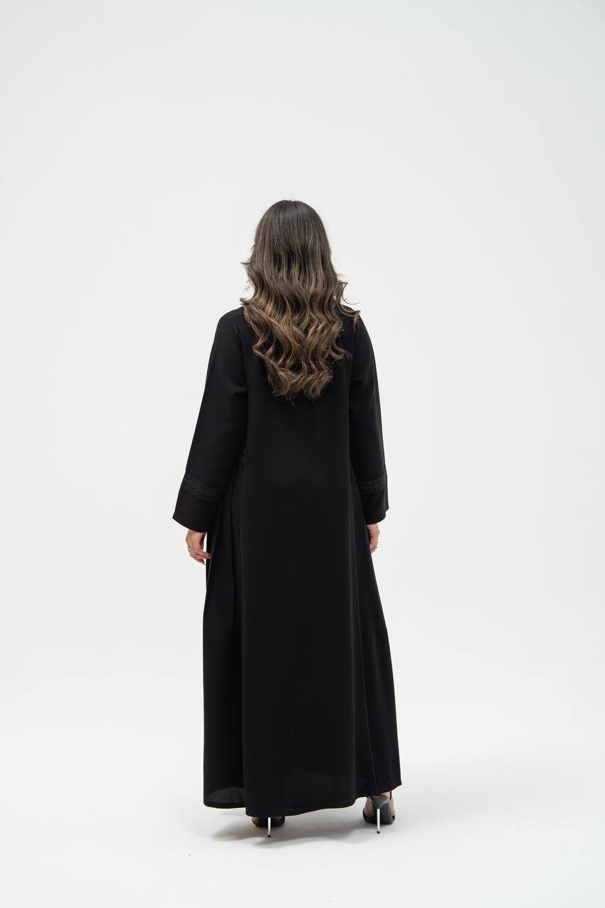 Black crepe abaya with hand-stitched details.C:6700 black crepe