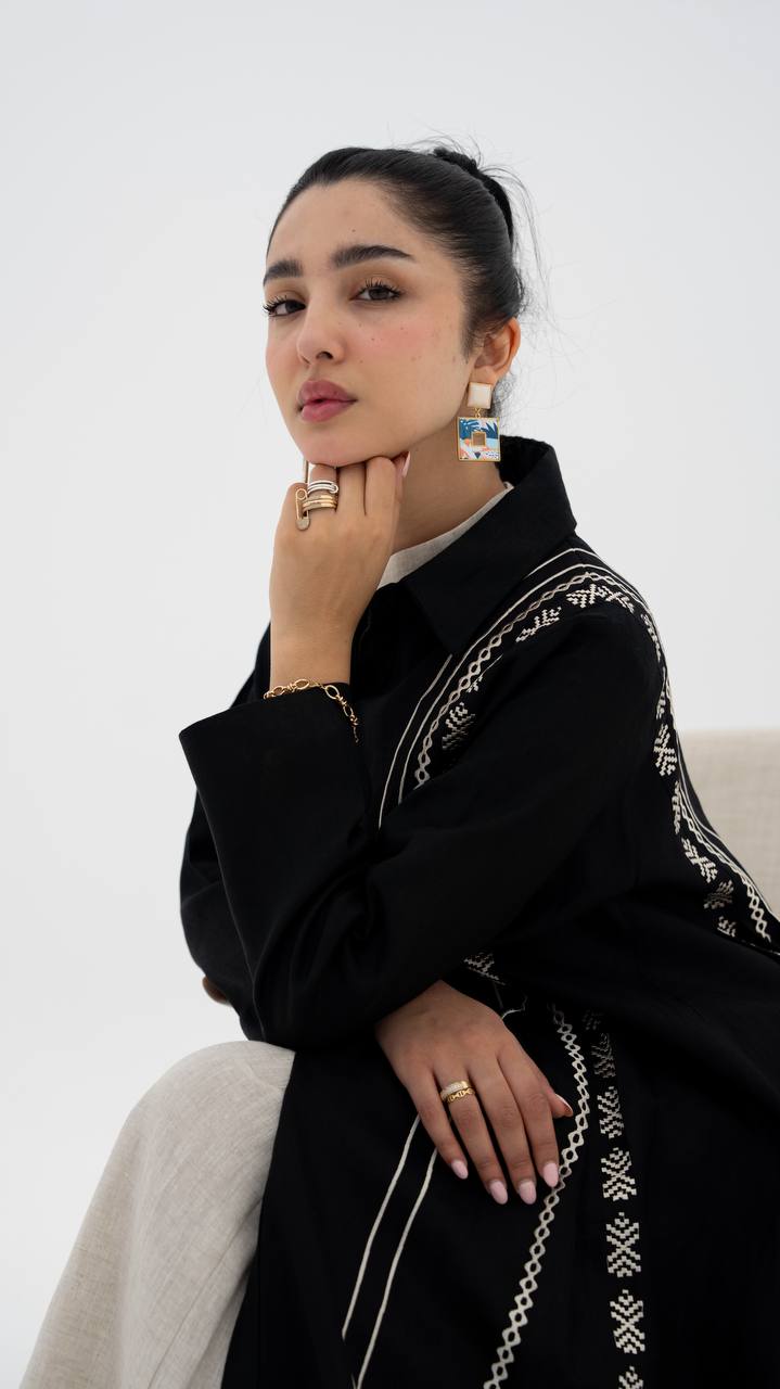 Linen abaya in black with embroidery. C:6683