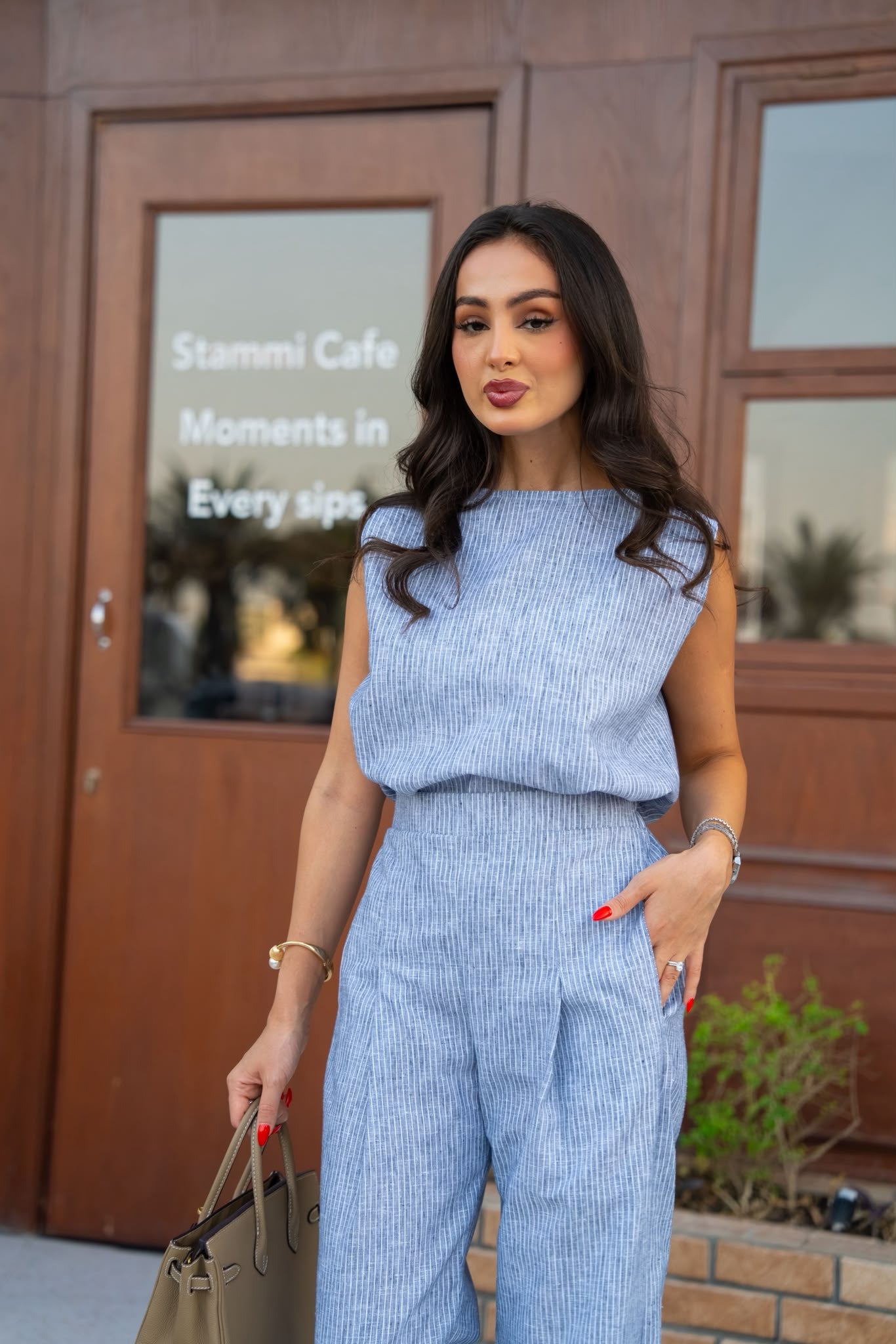 A blouse and pants set in sky blue cotton.C:249