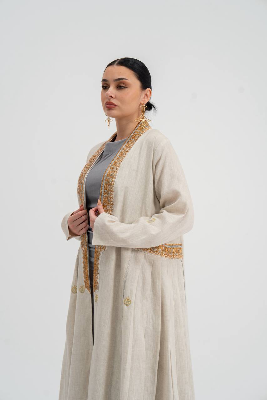 Linen abaya in light beige with embroidery. C:6745