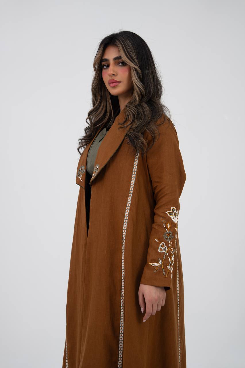 Camel-colored linen trench coat with hand embroidery and beading. C:6768