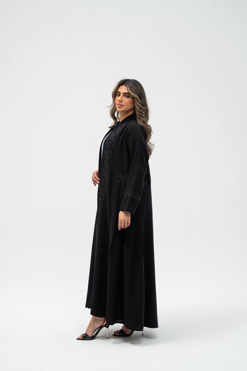 Black crepe abaya with hand-stitched details.C:6700 black crepe