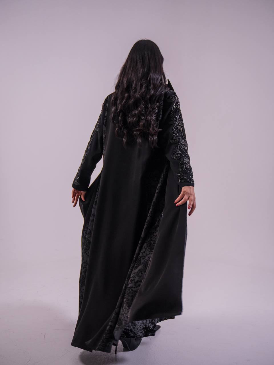 Crepe blazer abaya with black printed crepe and hand-stitched details.C:6733