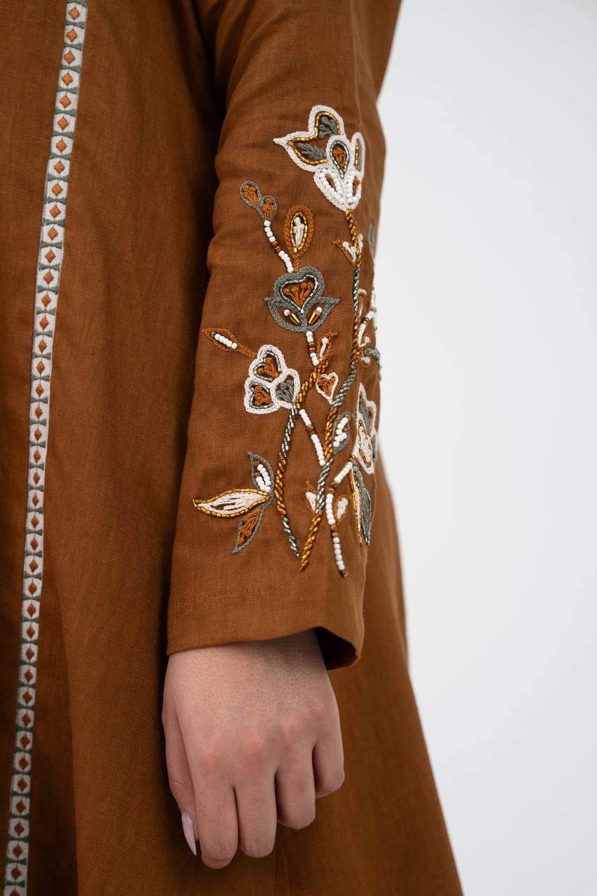 Camel-colored linen trench coat with hand embroidery and beading. C:6768