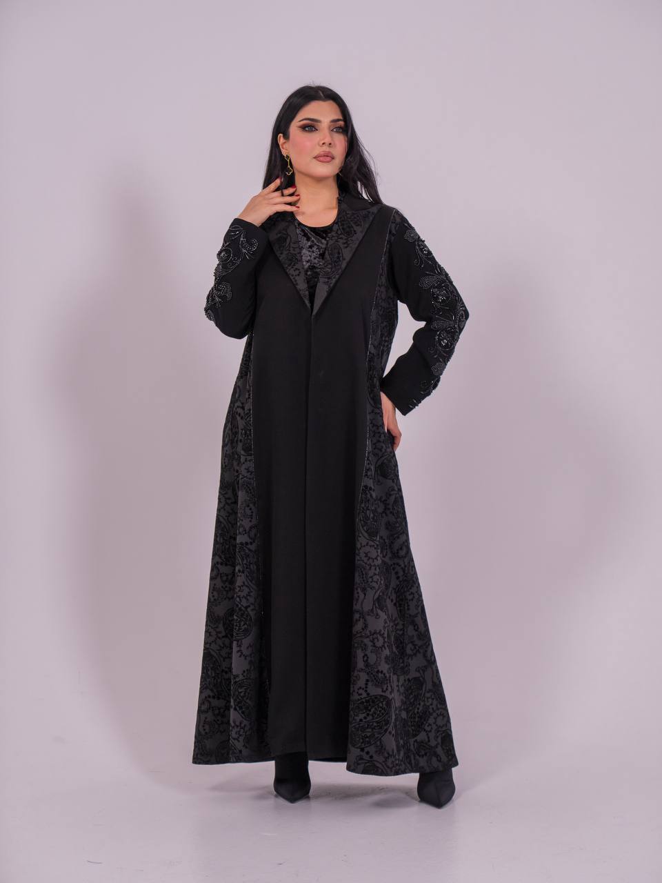 Crepe blazer abaya with black printed crepe and hand-stitched details.C:6733