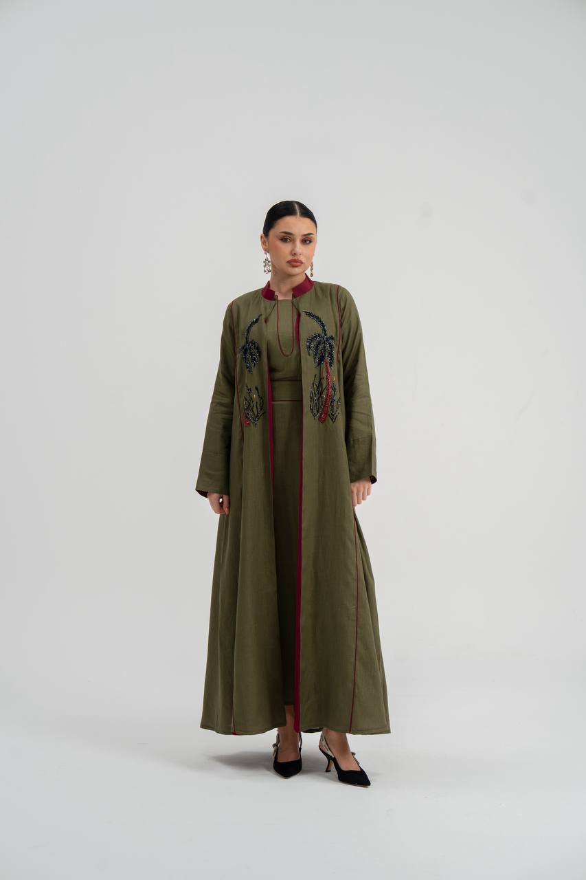 Linen abaya in olive green with hand embroidery. C:6748