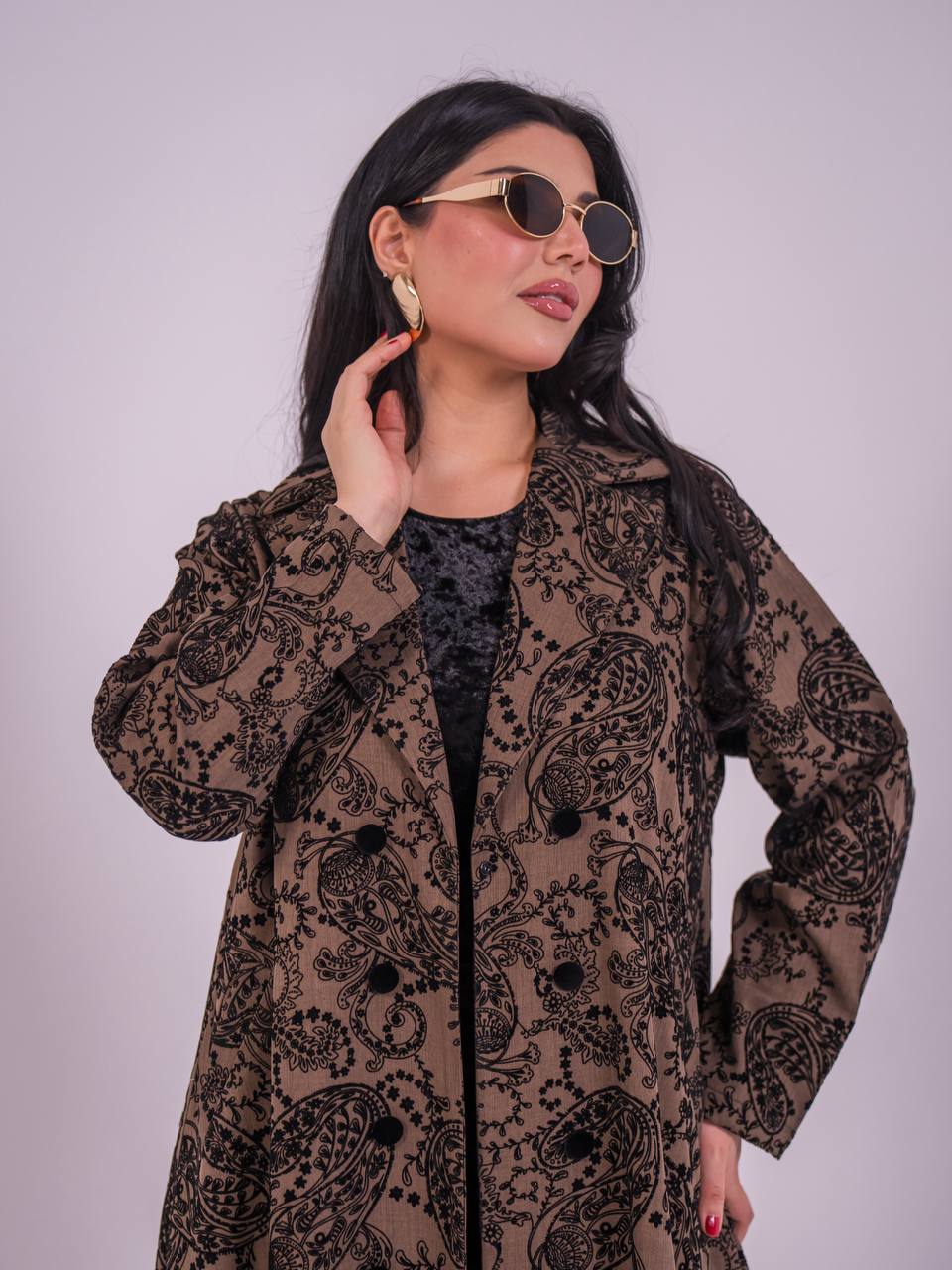 A brown abaya made of crepe fabric with a velvet print.C:6732
