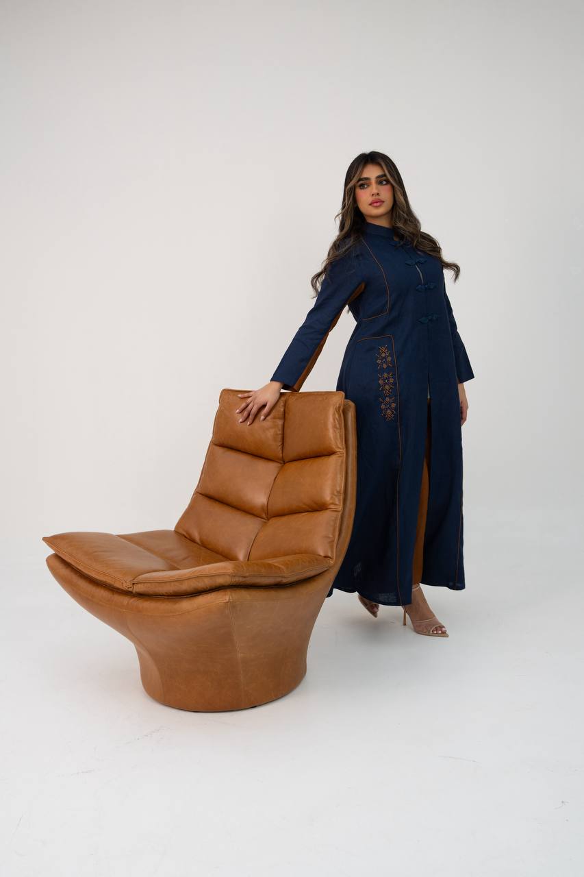 Linen abaya in navy blue with hand-stitched details. C:6766