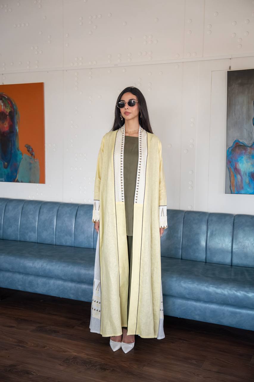 Abaya made of butter yellow linen fabric with embroidery. C:6778