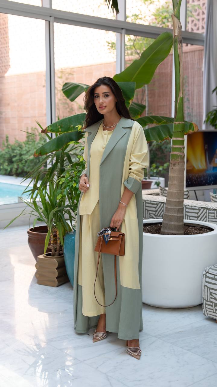 Linen abaya in yellow and pistachio green with hand-stitched details.C:6798