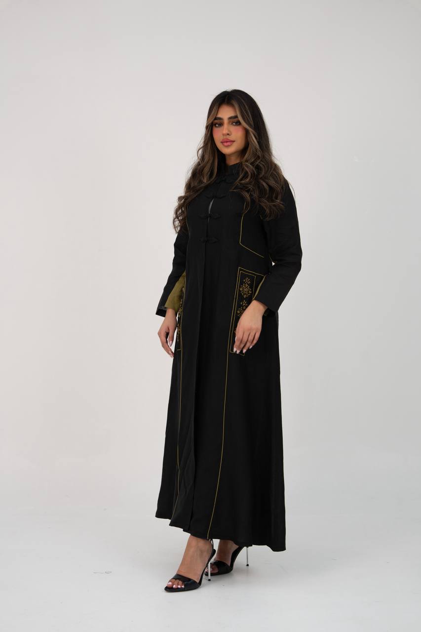 Linen abaya in black with hand embroidery. C:6766