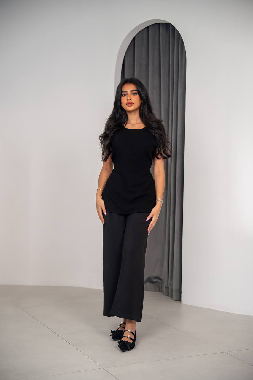 Practical set consisting of a blouse and pants in black crepe fabric C:201