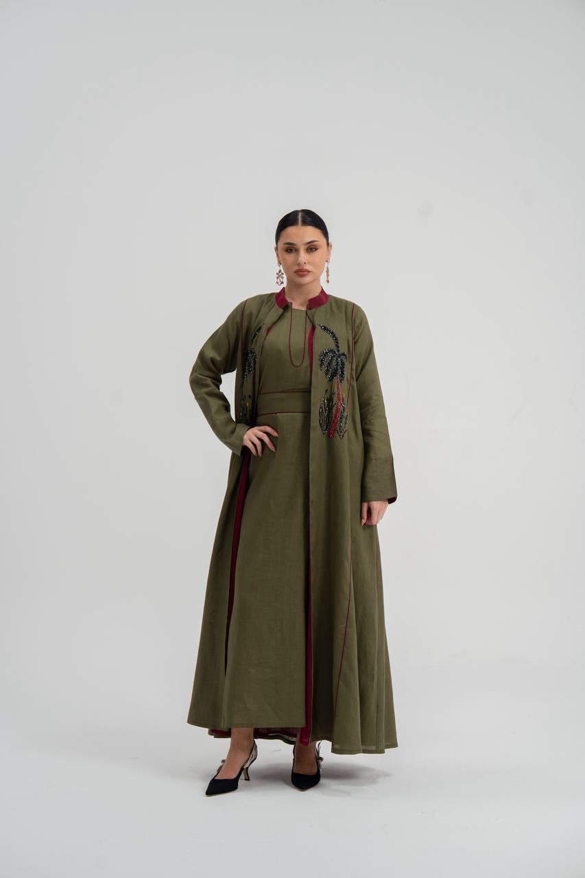 Linen abaya in olive green with hand embroidery. C:6748